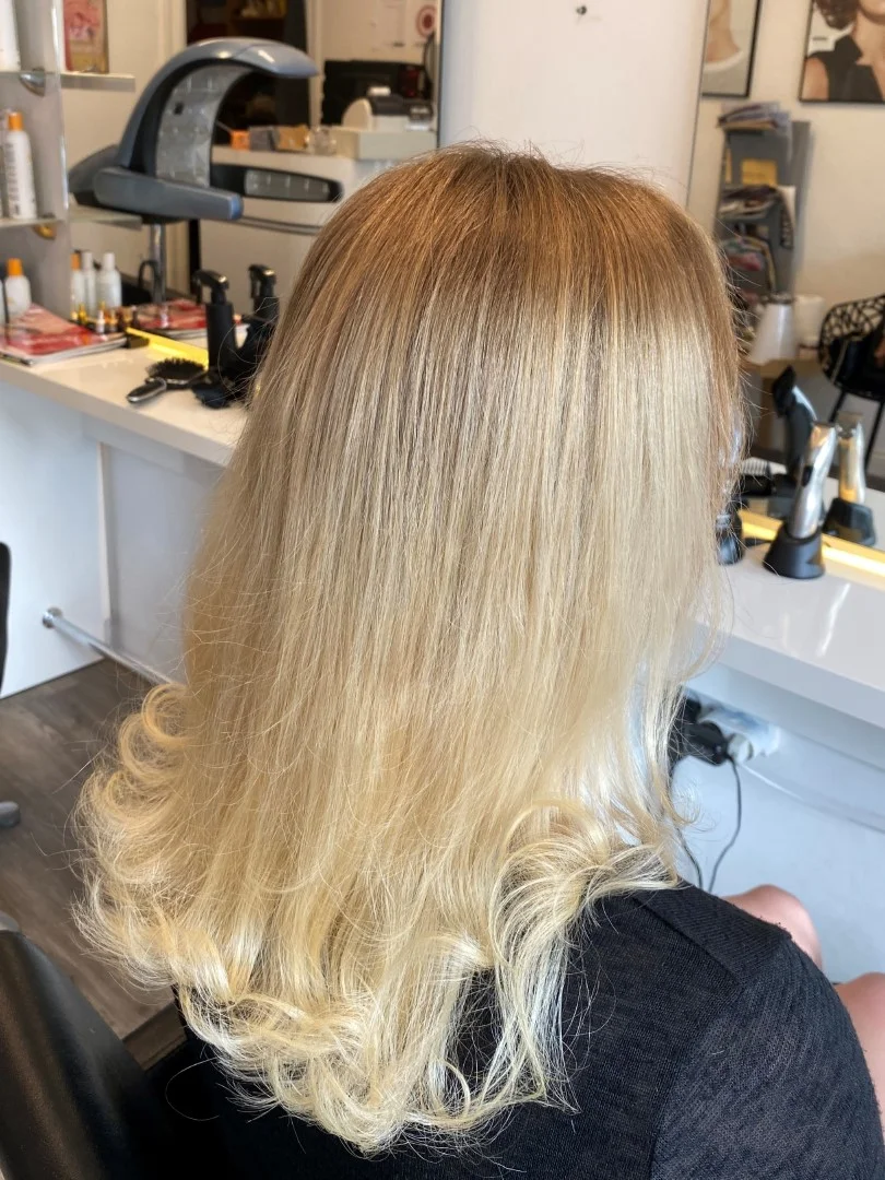 Picture of a lady getting an haircut